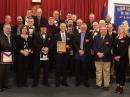 Members of the Sequin-Level Lodge #140 Ancient Free & Accepted Masons, of Newington, Connecticut, honored ARRL in a special presentation on April 7, 2022. Among those who participated were (front row, right to left) ARRL staff representatives Kim McNeill, KM1IPA, Assistant Member Services Manager; Yvette Vinci, KC1AIM, Member Services Manager; Josh Johnston, KE5MHV, Director of Emergency Management; Bob Naumann, W5OV, Director of Operations; Bob Inderbitzen, NQ1R, Director of Public Relations and Innovation; Lodge #140 Master Jon Faasen, AA1EZ, and Town of Newington Mayor Beth DelBuono.